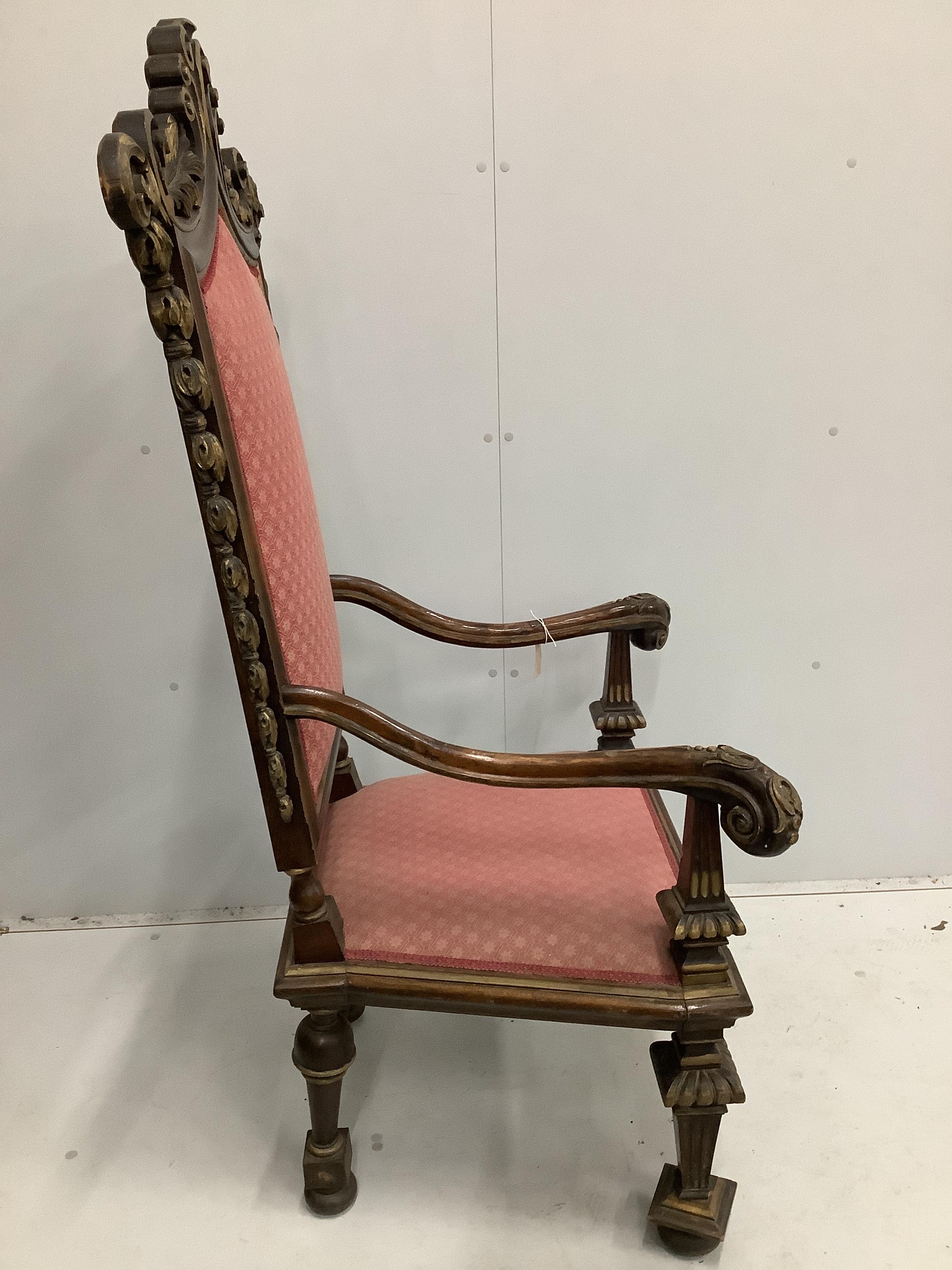 An 18th century style parcel gilt walnut high back elbow chair, width 78cm, depth 56cm, height 147cm